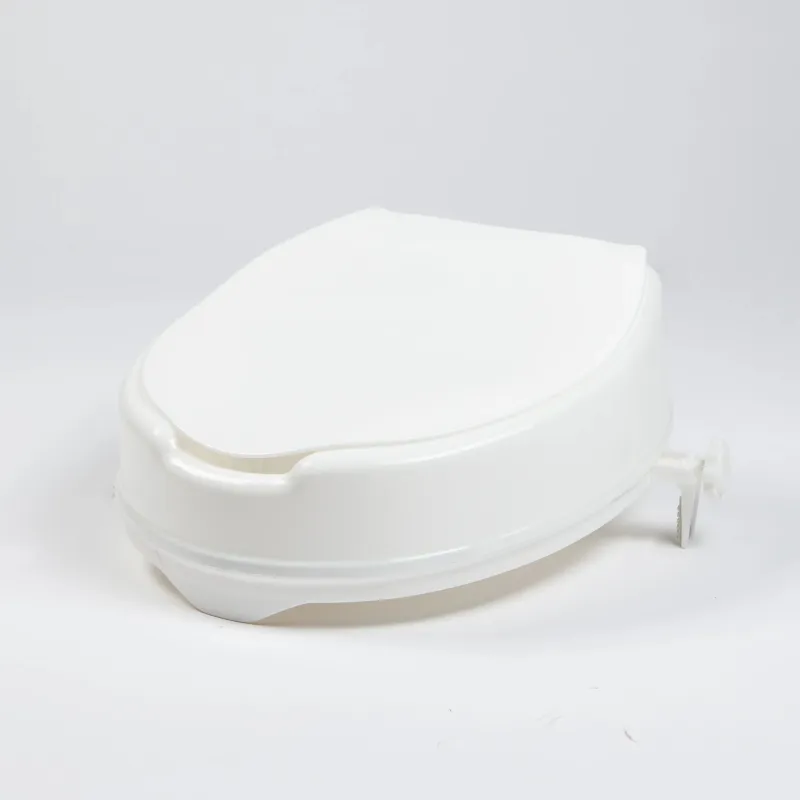 Paaugstināts tualetes sēdeklis ar vāku, 15 cm