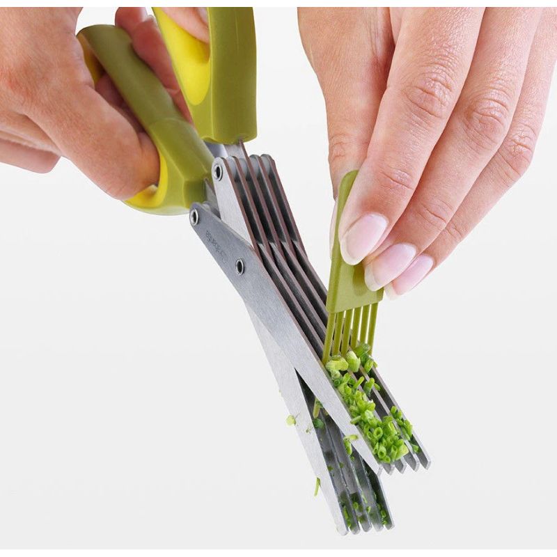 Šķēres zaļumu ar tīrītāju zaļš