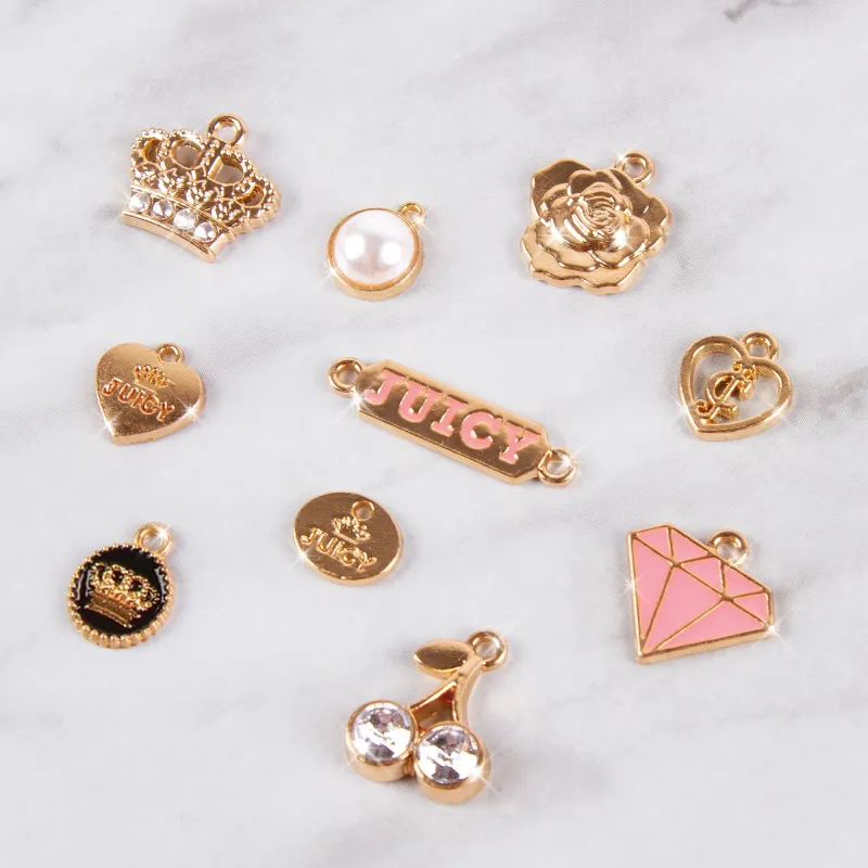 MAKE IT REAL Juicy Couture ķēdītes un piekariņi
