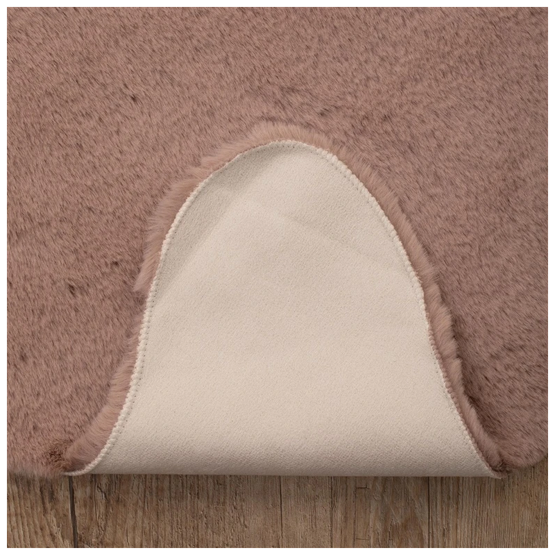 Paklājs māksl.trušādas 90x60 800 gsm roz